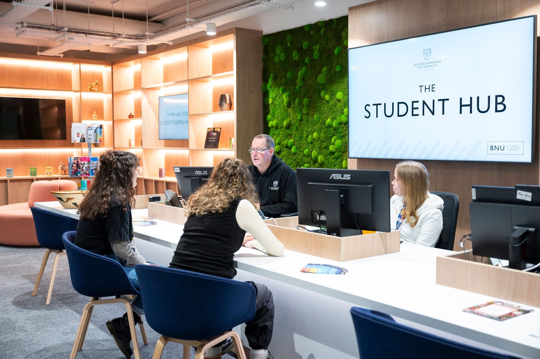 Students and staff in Student Hub