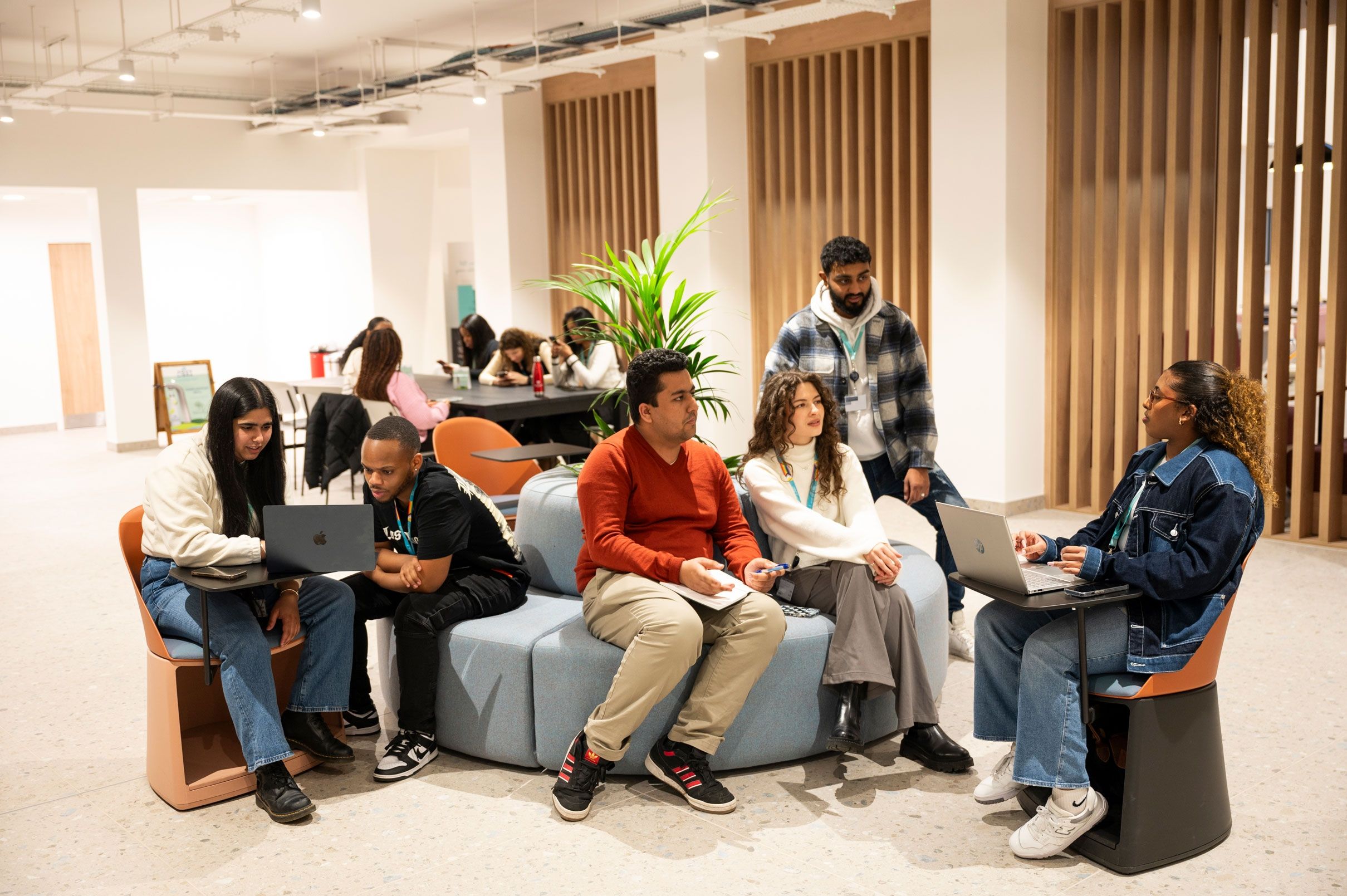 Group of students hanging out in the Atrium