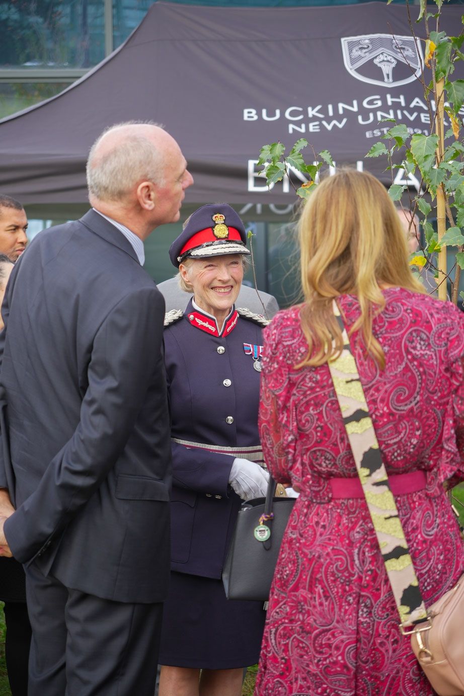 The Countess Howe talked to BNU colleagues by Queens tree