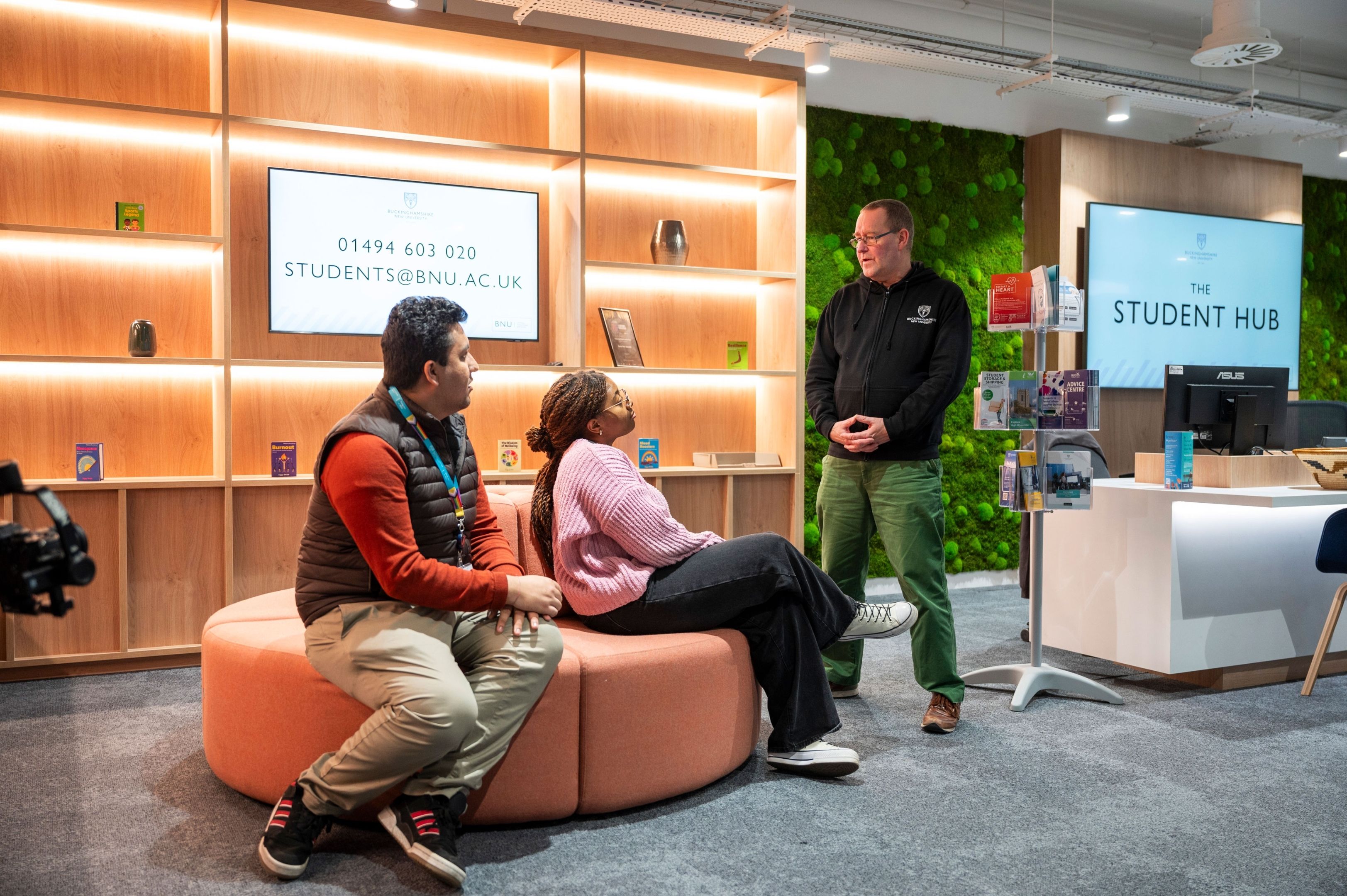 students in the student hub in atrium
