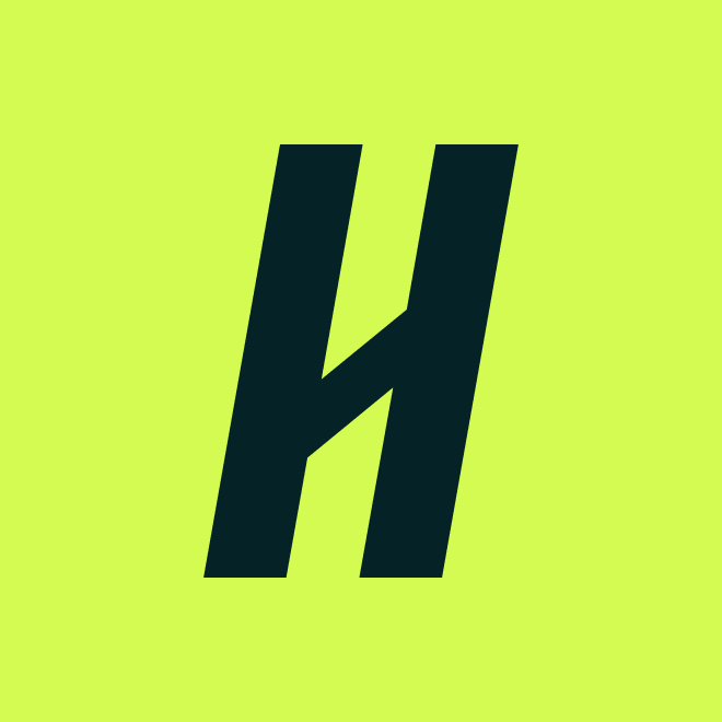 The letter 'H' in front of a green background.