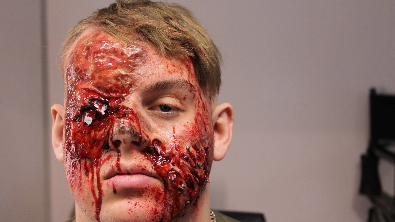 A fake bloodied face of a student applied by a Special Effects student.