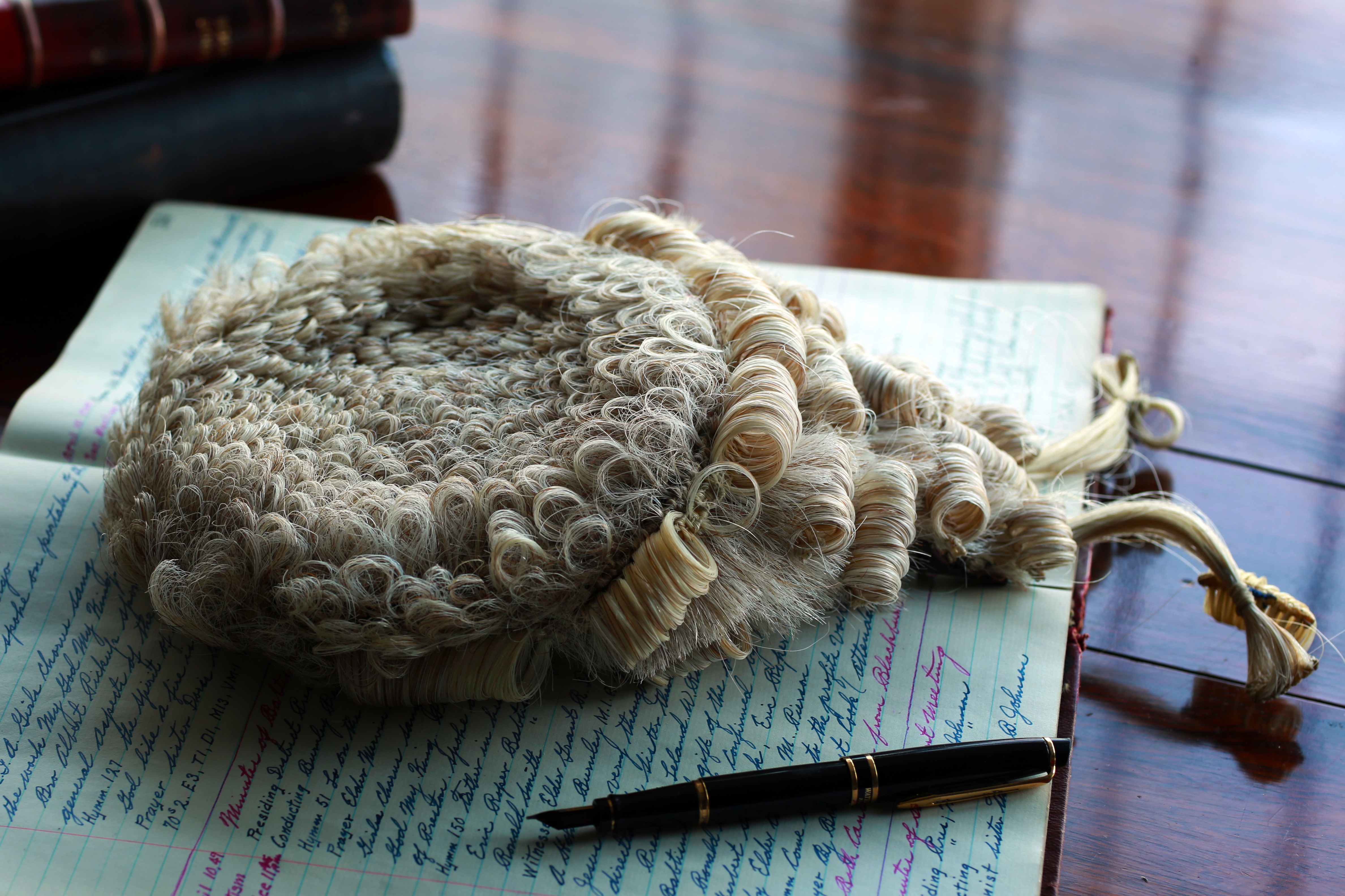 Judge wig on notebook