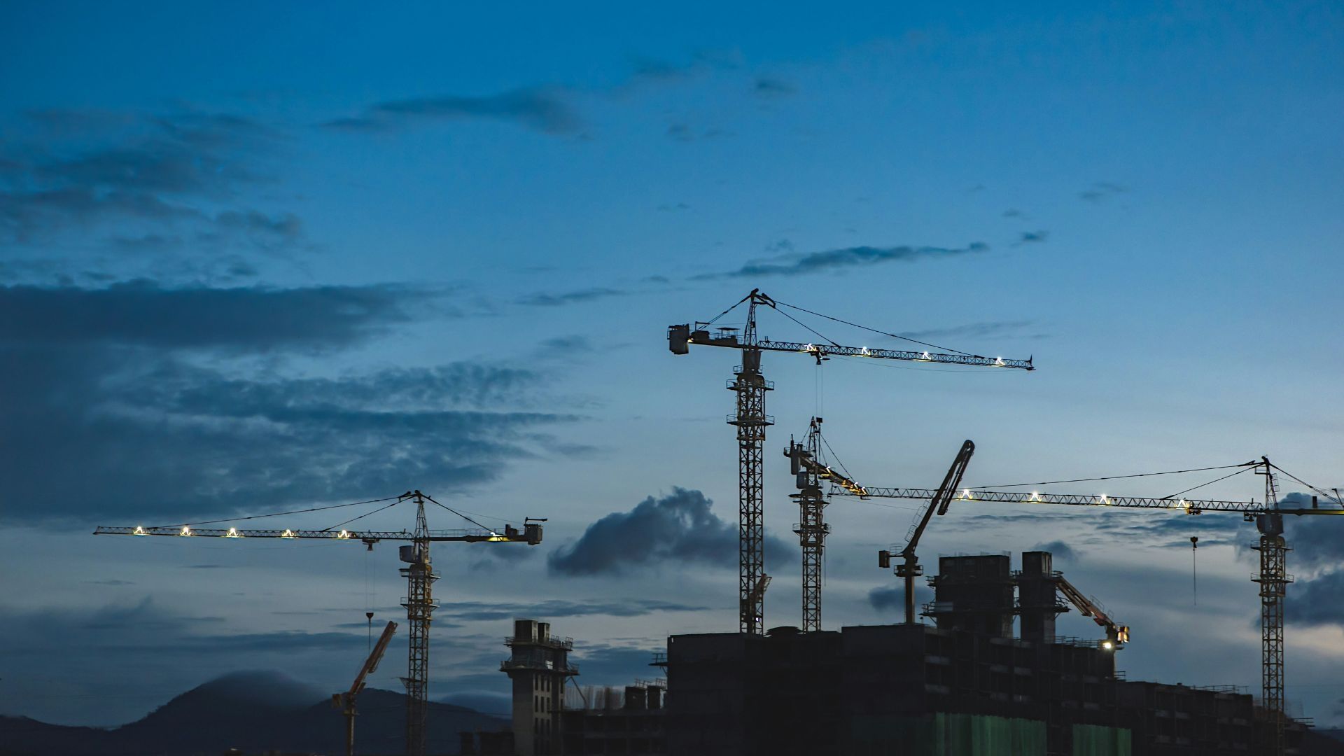 Cranes in the skyline on a building site