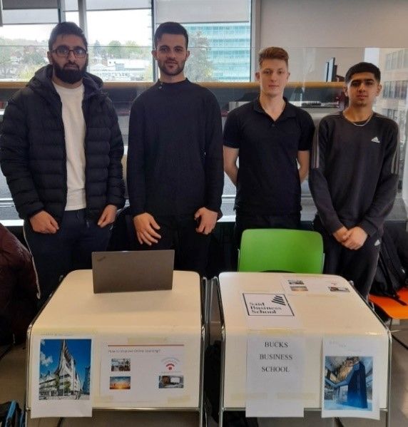 Business students presenting their work at the year-end showcase