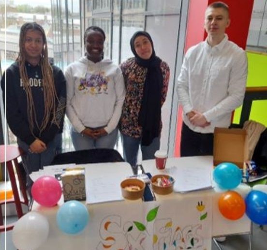 Business students presenting their work at the year-end showcase