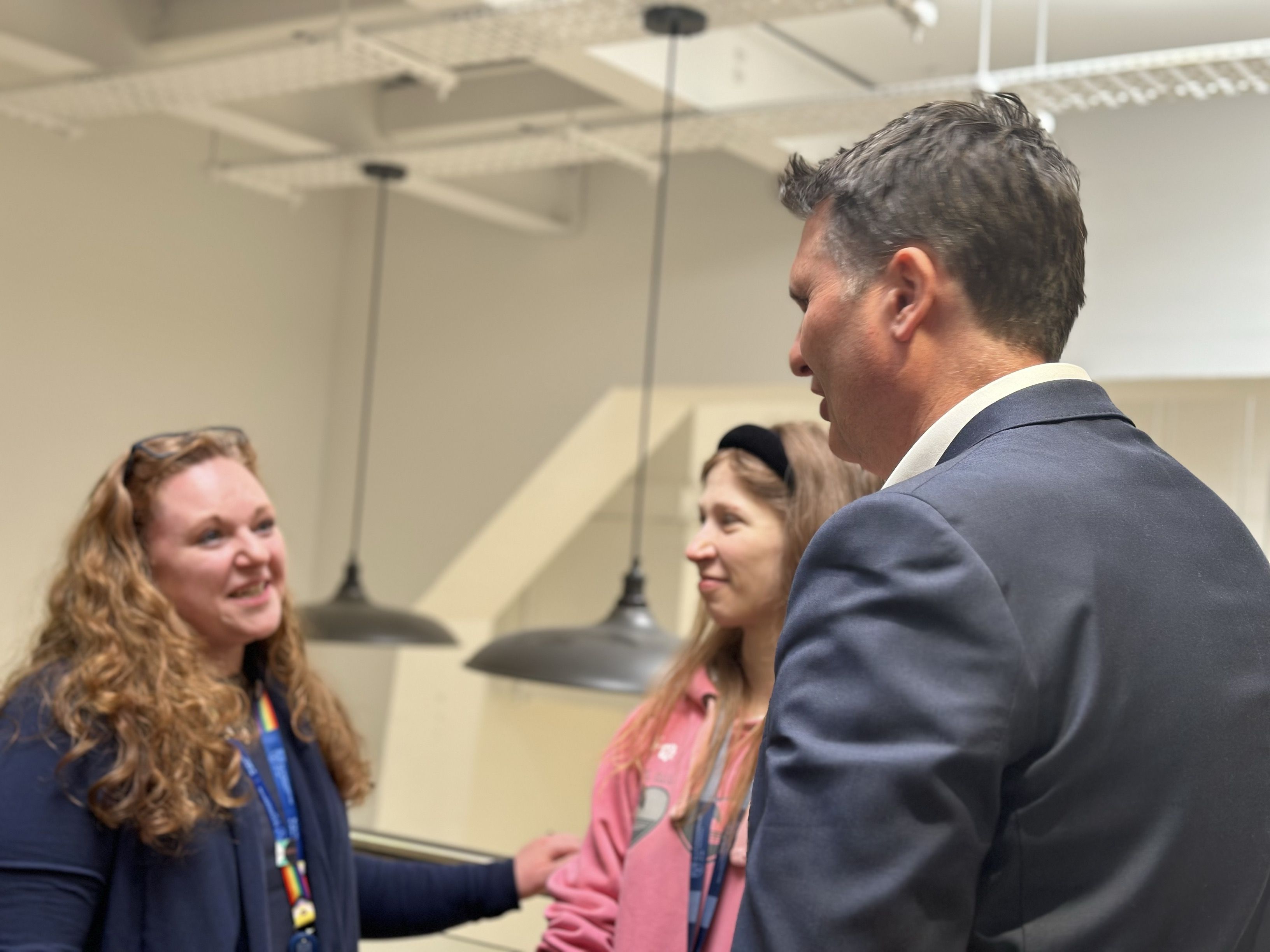 Paul Morgan talks to colleagues at drinks reception