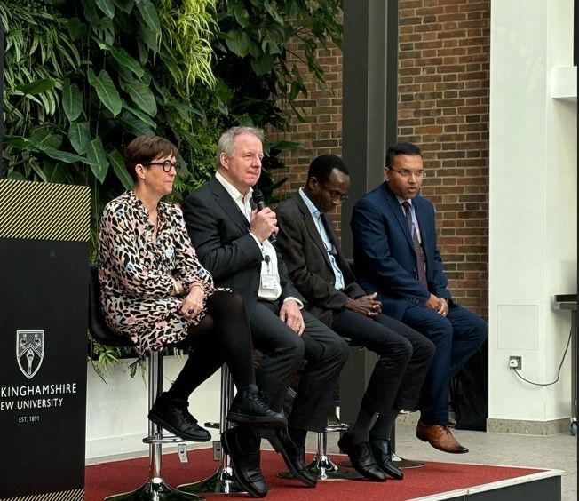 Four speakers sat down