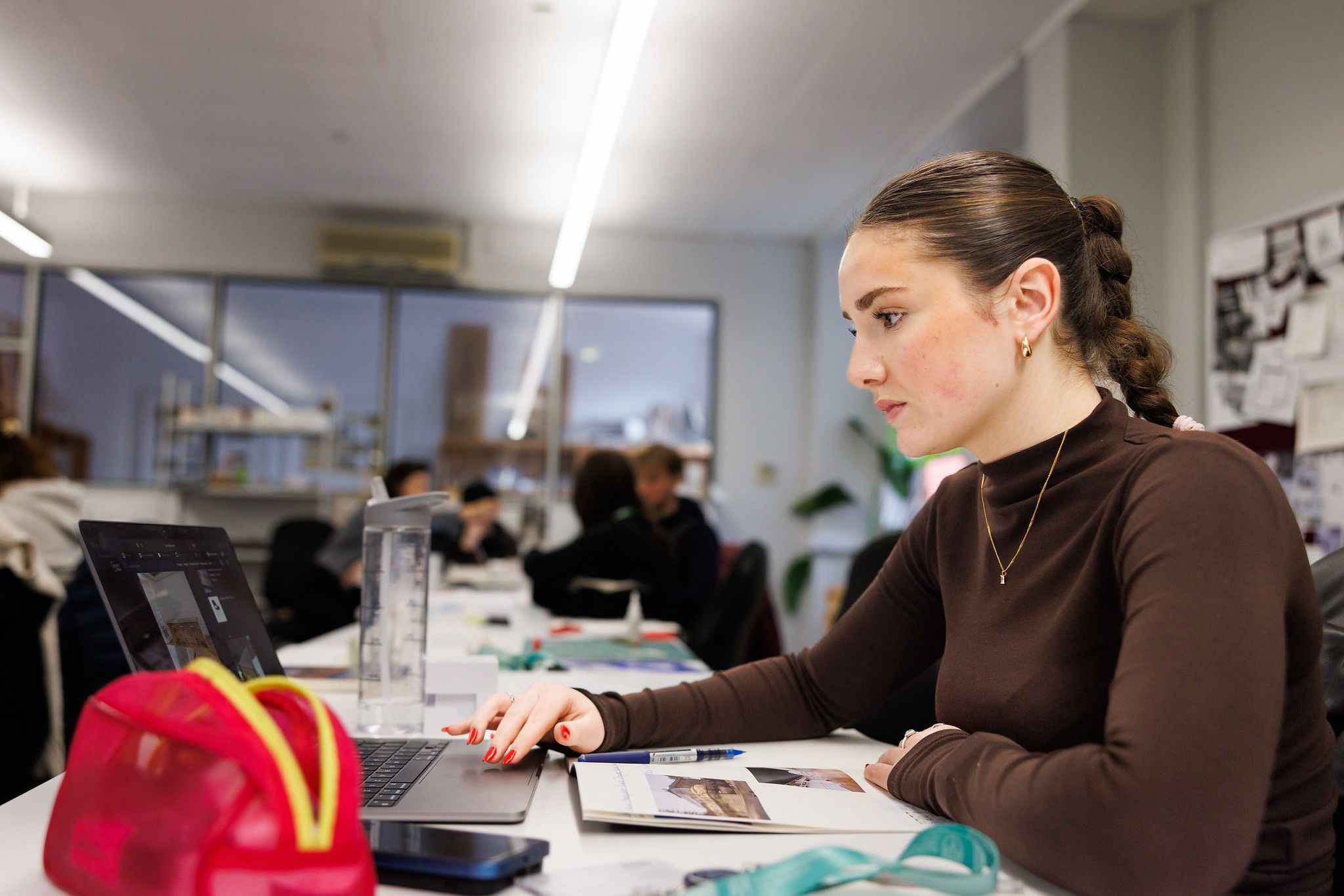 Interior and Spatial student looking at a laptop