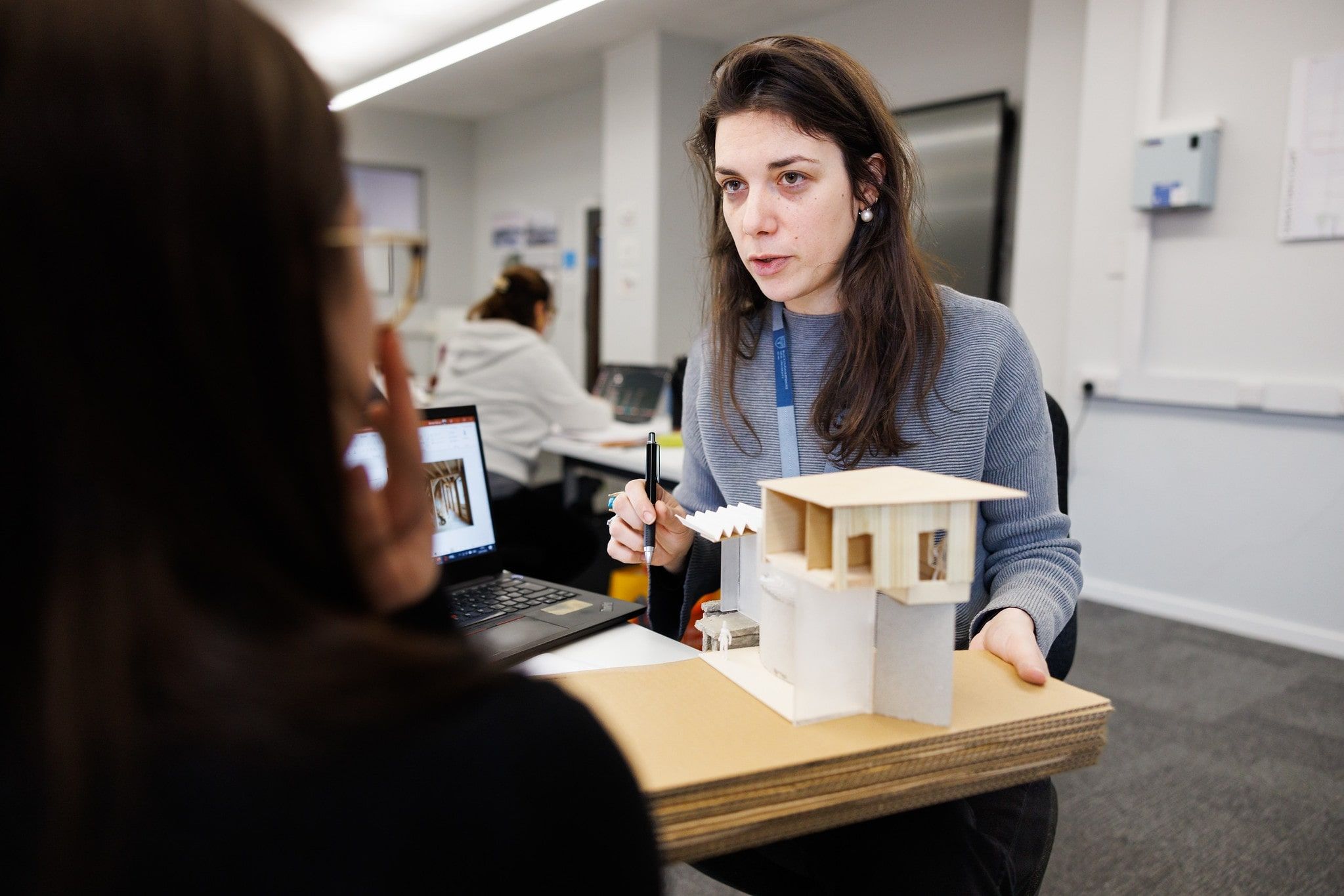Interior and Spatial Design lecturer helping a student
