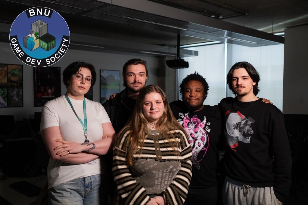 Five members of the Games Development Society stood together