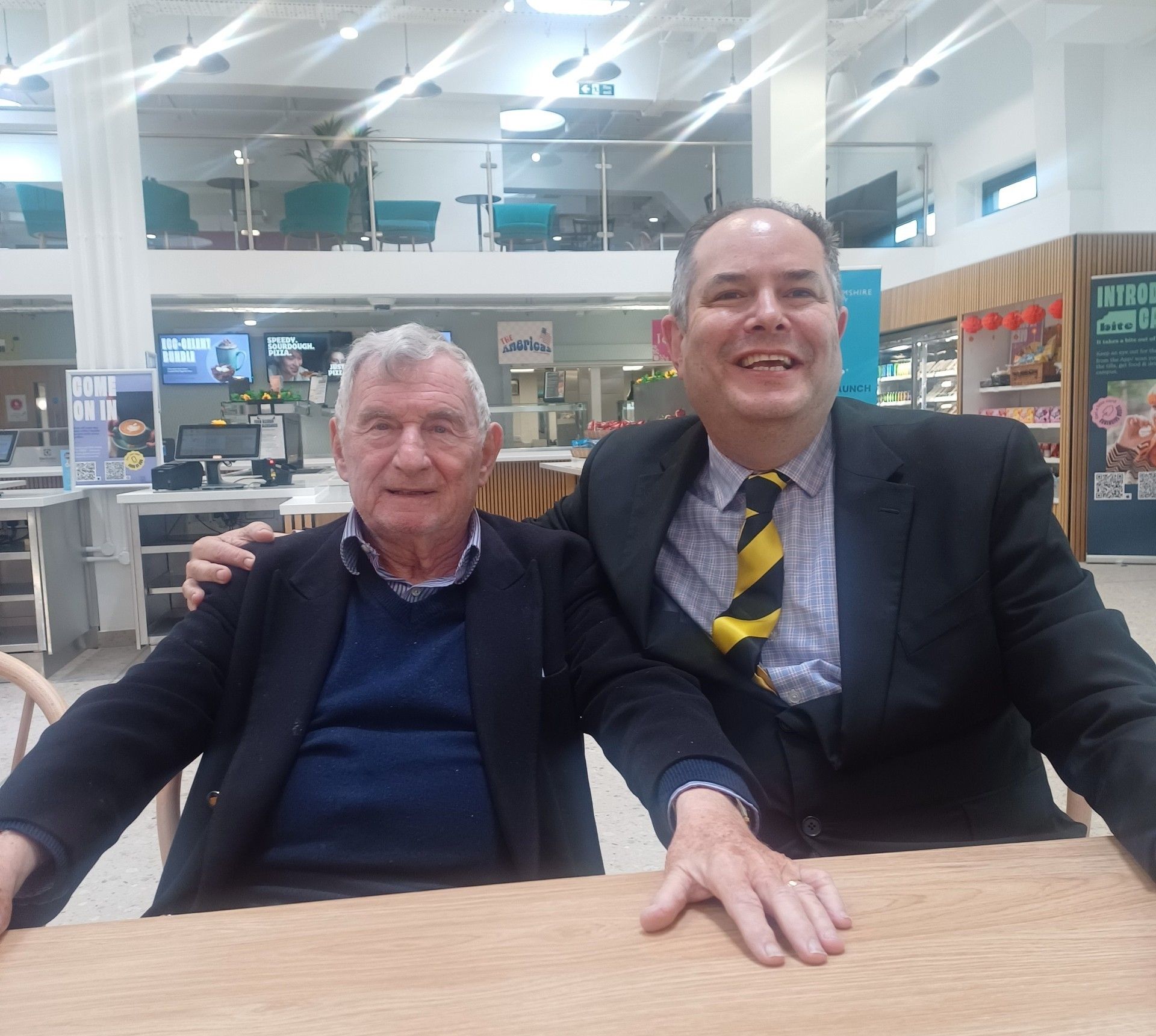 Law Lecturer Ze’ev Portner with David Pleat in the Atrium