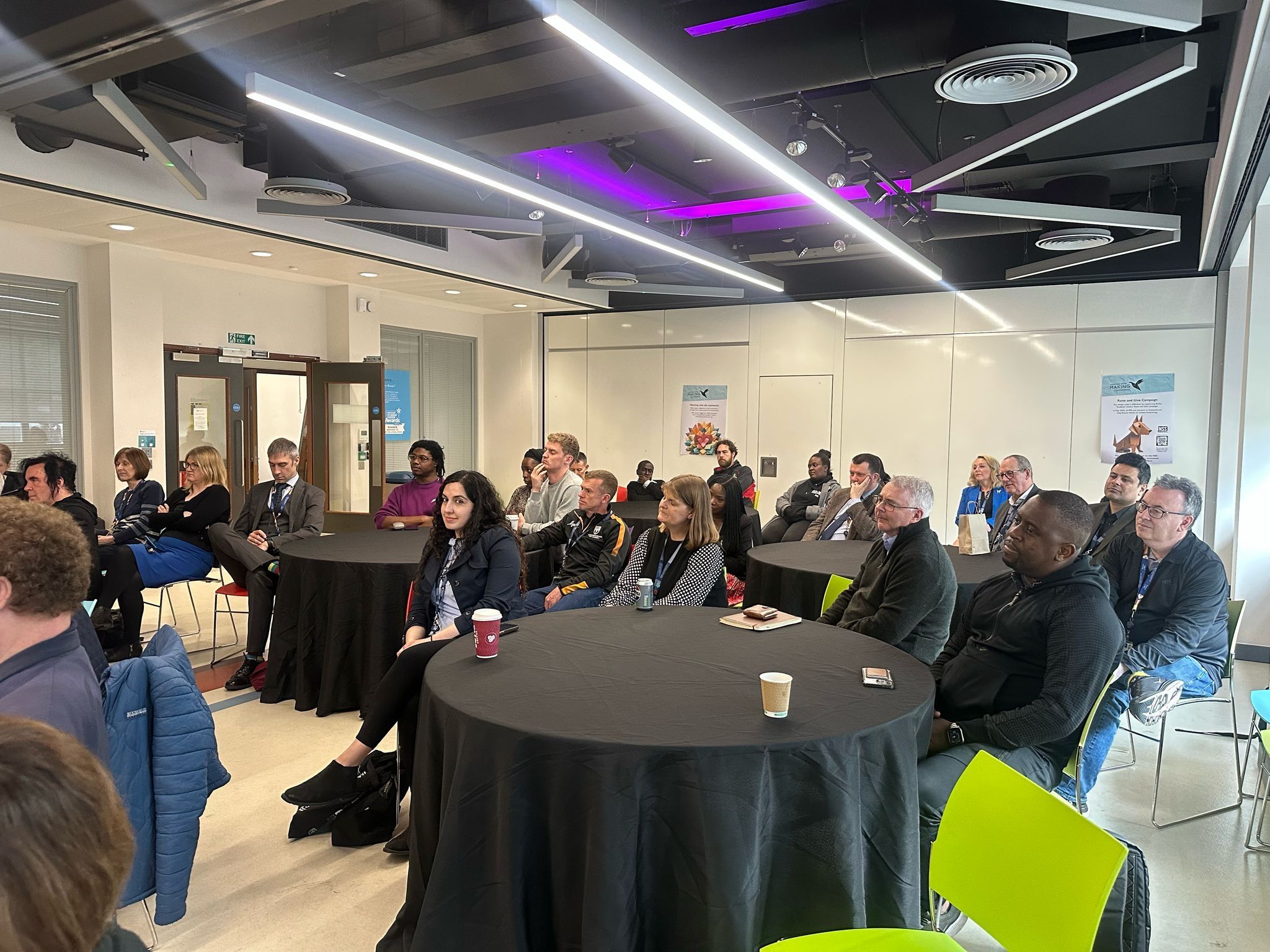 Staff and students listening to David Pleat