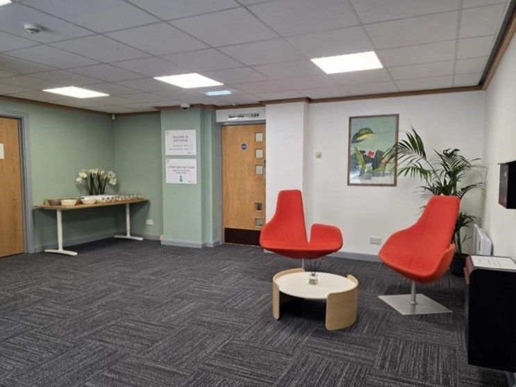 Communal space at Alex House with tables and chairs